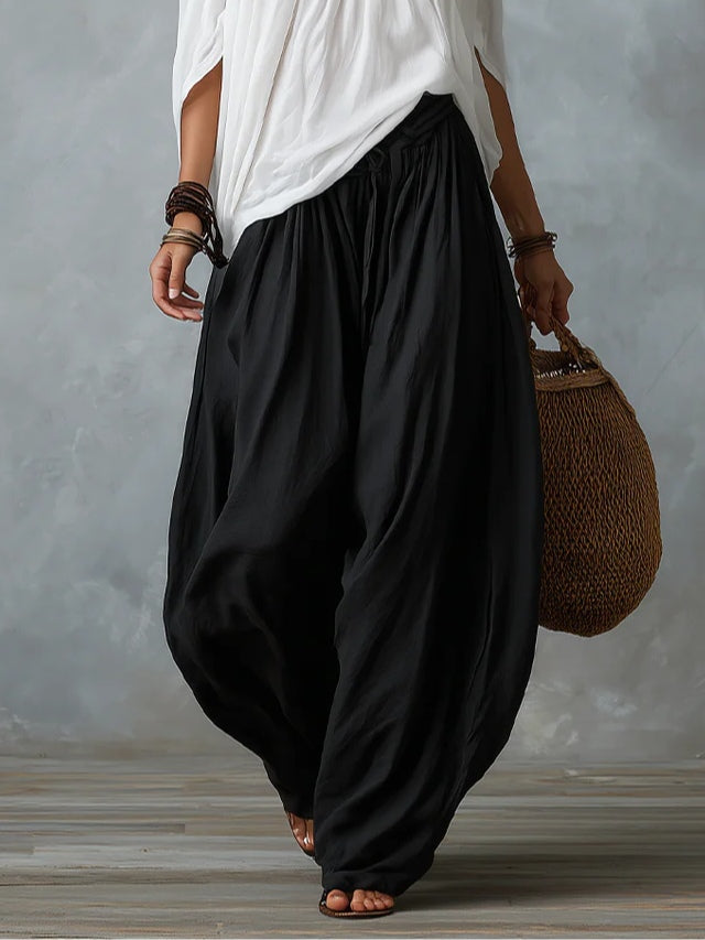 Set Top Bianco Off-Shoulder e Pantaloni Larghi