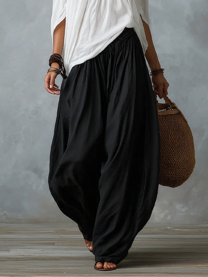 Set Top Bianco Off-Shoulder e Pantaloni Larghi