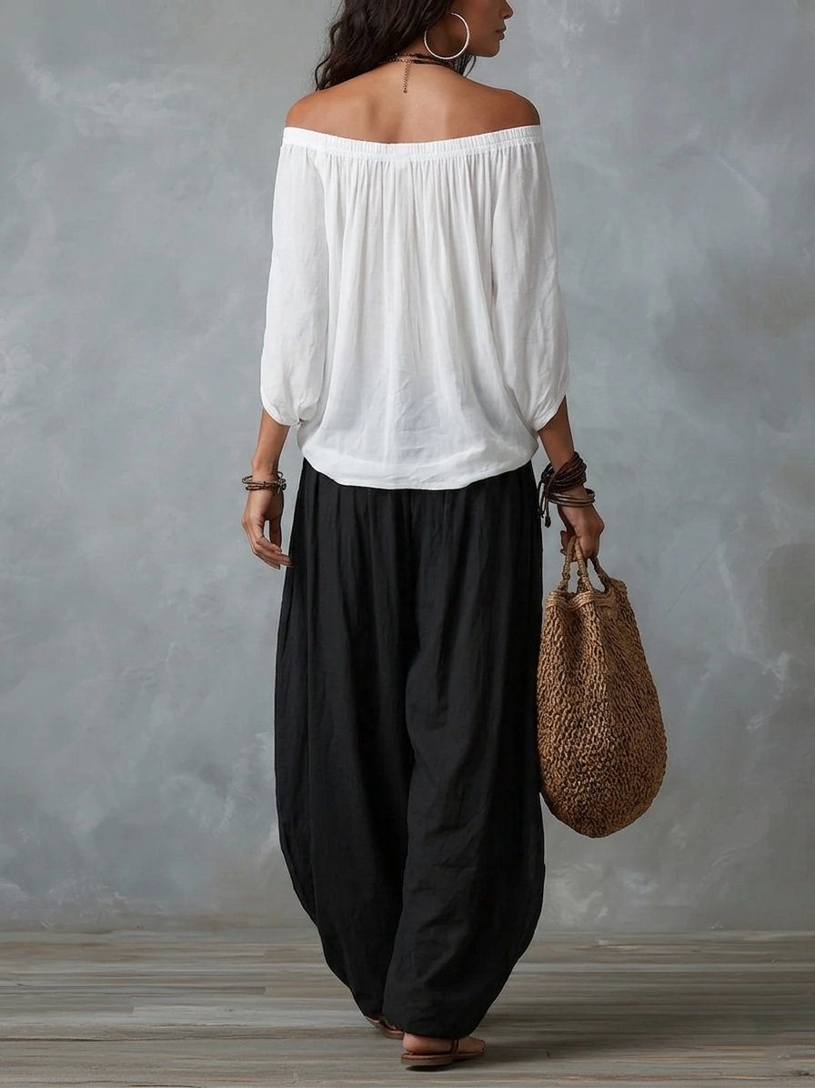 Set Top Bianco Off-Shoulder e Pantaloni Larghi