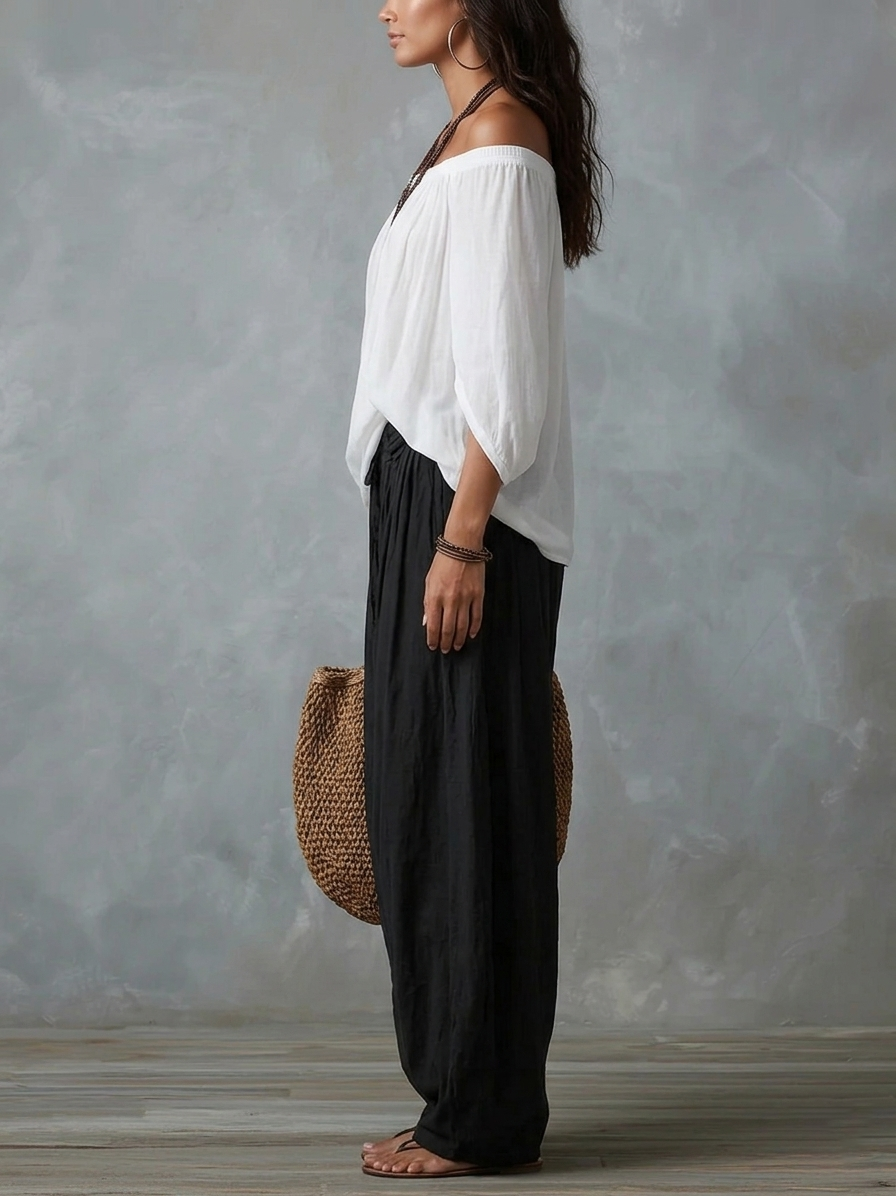 Set Top Bianco Off-Shoulder e Pantaloni Larghi