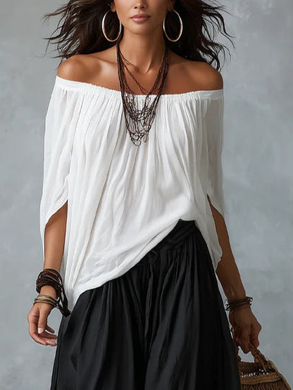 Set Top Bianco Off-Shoulder e Pantaloni Larghi
