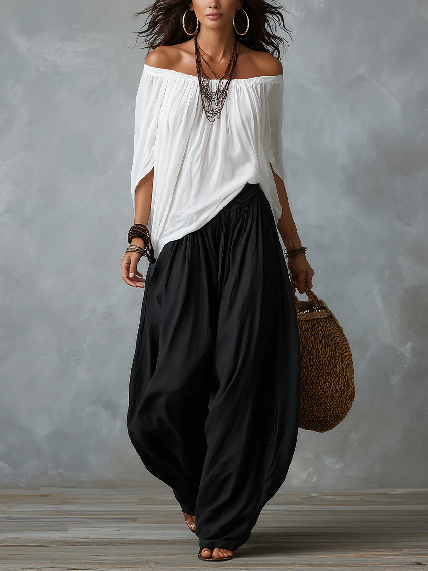 Set Top Bianco Off-Shoulder e Pantaloni Larghi